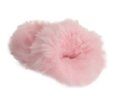 Soft pink tulle or tutu-like decorative pom-pom fabric bundle